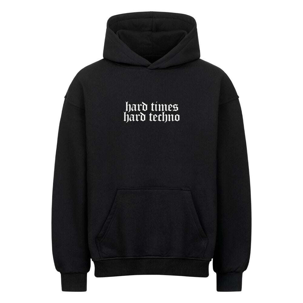 Black oversized hoodie with "hard times hard techno" text, heavy cotton blend, brushed interior and exterior, drop shoulders, no drawstring hood.